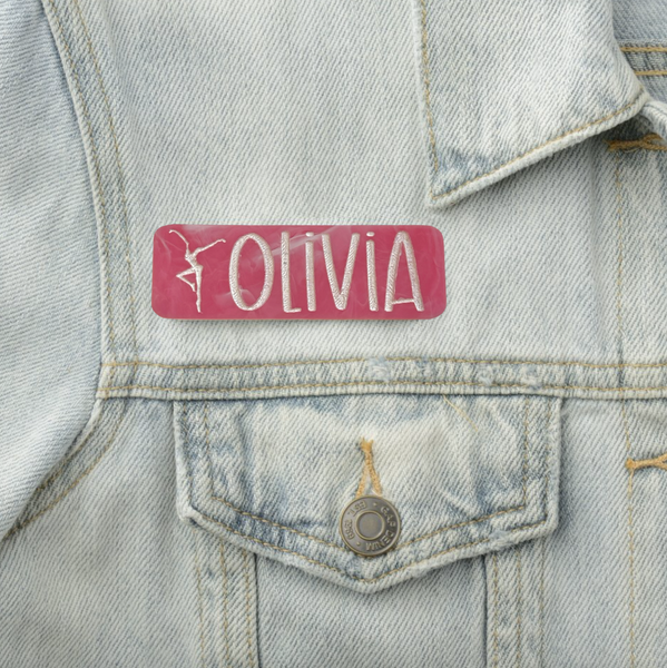 a patch on a jean jacket that says otivia