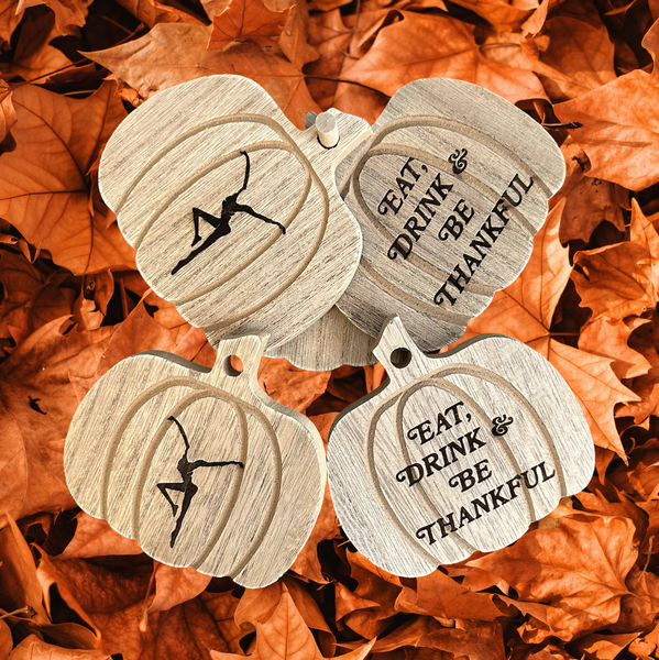 three wooden tags that say eat drink and be grateful