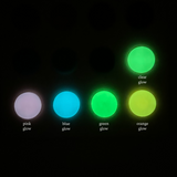 a group of different colored lights in the dark