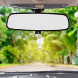 a car's rear view mirror with a broken windshield