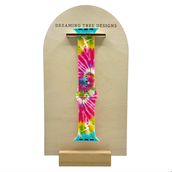 a skateboard with a colorful tie - dye design on it